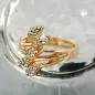 Preview: Ring 17mm Blütenranke rotvergoldet mit 5 Blättern mit Glassteinen Ringgröße 50